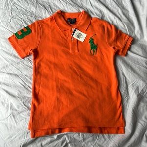 Child size 6 Orange Polo Shirt.  Brand new, never has been worn with tag